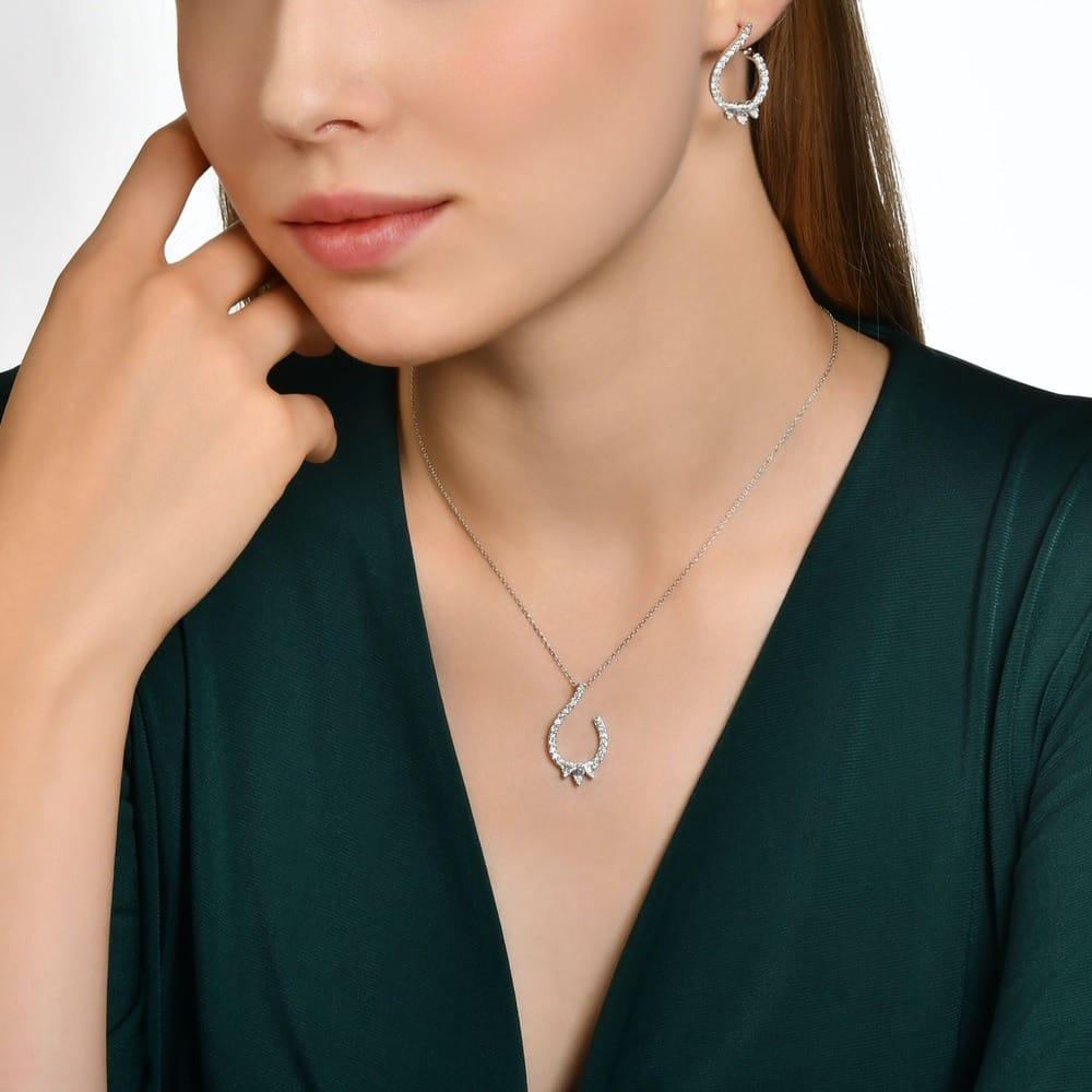 0.60 Karat Mezza Baget Diamante Collana