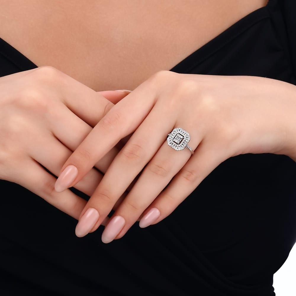 0.65 Karat Grace Baget Diamante Anello