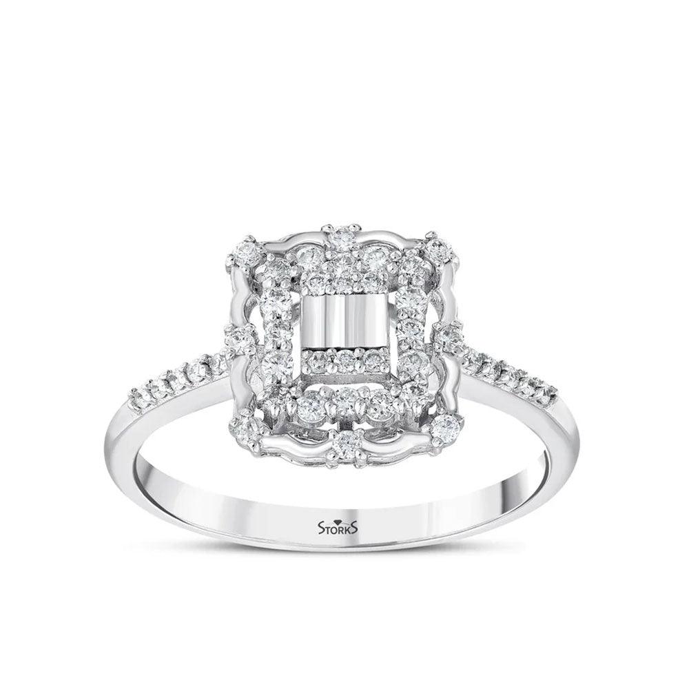 0.27 Karat Cora Diamante baguette Anello