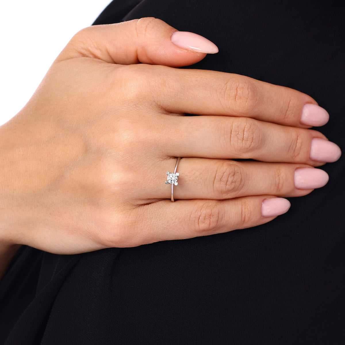 0.30 Karat Tetra Solitario Diamante Anello