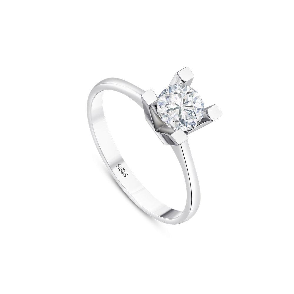 0.71 Karat Tetra Solitario Diamante Anello