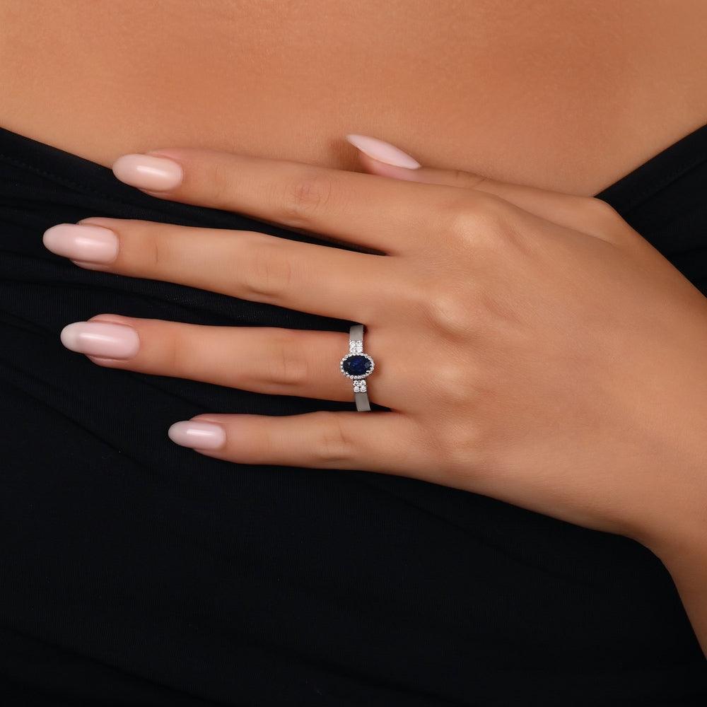 0.88 Karat ovale Safir Diamante Storks Anello